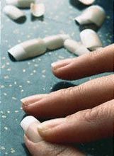 Manicured Finger Nails and Loose False Nails